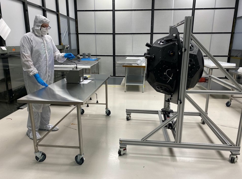 Particle count measurements are taken of the Goddard Laser for Absolute Measurement of Radiance (GLAMR) integrating sphere in a Class 10K clean tent at GSFC.